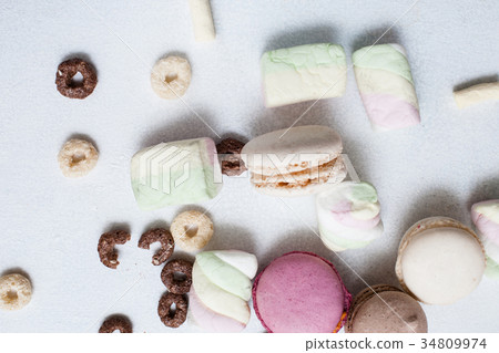 Colorful sweets on white background top view Colorful sweets on white background top view 34809974