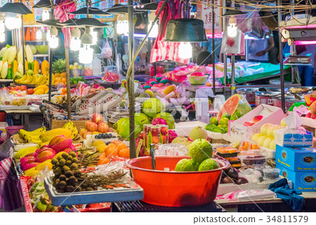 Fruit stall in a night market Fruit stall in a night market 34811579
