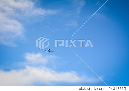 Airplane flying in the blue sky Airplane flying in the blue sky 34817215