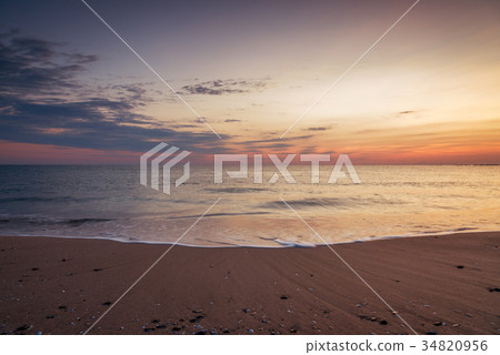 Beautiful tropical sunrise on the beach. 34820956