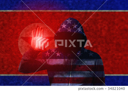 American hacker touching north korean flag 34821040
