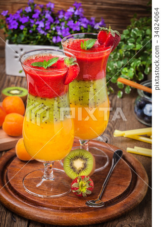 Smoothies with fresh fruit. 34824064