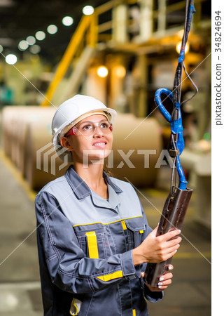 woman operating crane 34824694