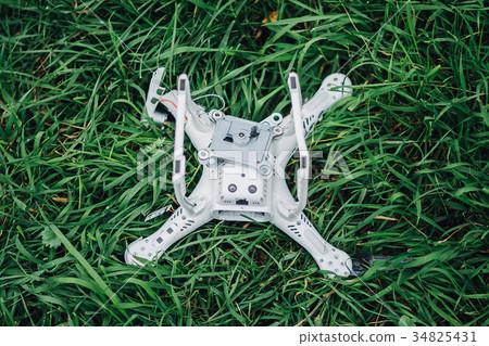 Crashed drone on the ground Crashed drone on the ground 34825431