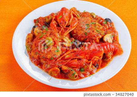 chicken meat stew on white plate 34827040