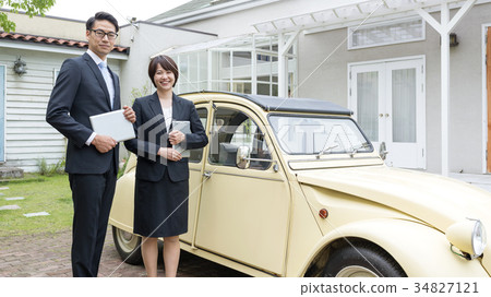 Business woman with retro car and businessman 34827121
