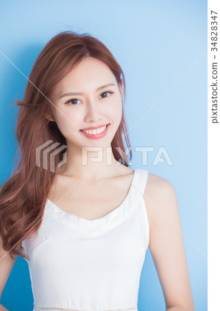 woman on blue background woman on blue background 34828347