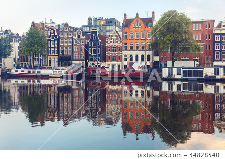 Morning Amsterdam canal with dutch houses 34828540