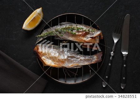 Fried fish with thyme and lemon Fried fish with thyme and lemon 34828551