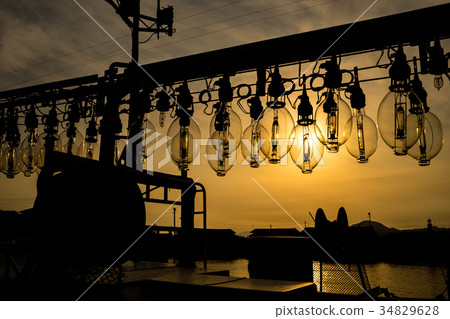 Squid fishing boat fishing lights and sunset Squid fishing boat fishing lights and sunset 34829628