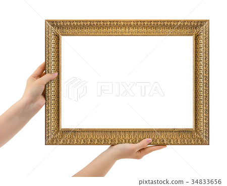 Wooden picture frame in hands 34833656