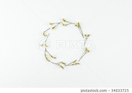 Round wreath made from yellow flowers 34833725
