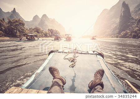 Relax on the Li River bamboo raft, China. 34835244