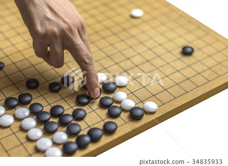 Playing Go or Igo. Isolate white background 34835933