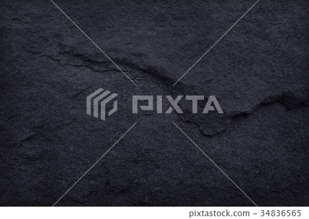 Dark grey black slate texture in natural patterns. Dark grey black slate texture in natural patterns. 34836565