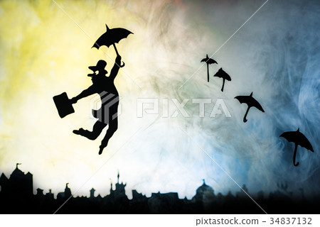 man is flying with an umbrella 34837132