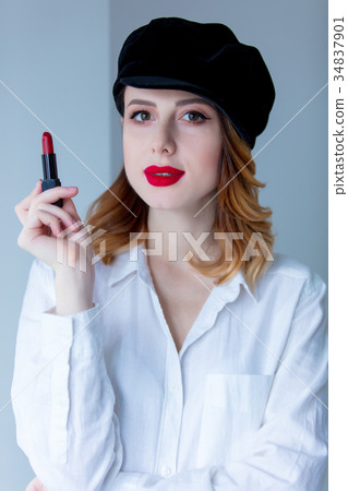 redhead woman in hat with lipstick for makeup redhead woman in hat with lipstick for makeup 34837901