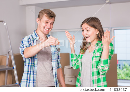 home, people, moving and real estate concept - home, people, moving and real estate concept - 34838487