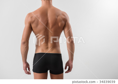 Rear view of attractive naked guy 34839039