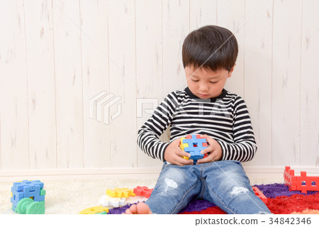 Boys playing in the room 34842346