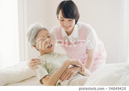 Care worker and senior visiting nursing home care Care worker and senior visiting nursing home care 34849428
