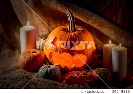 Halloween pumpkin head with burning candles Halloween pumpkin head with burning candles 34849816