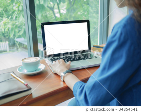 Asian young woman using laptop for shopping online Asian young woman using laptop for shopping online 34854541