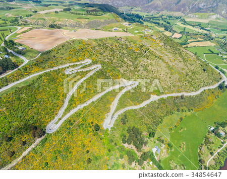 Winding Road on Mountain, Queenstown, New Zealand Winding Road on Mountain, Queenstown, New Zealand 34854647