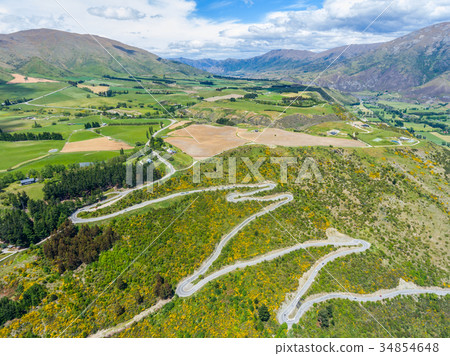 Winding Road on Mountain, Queenstown, New Zealand 34854648