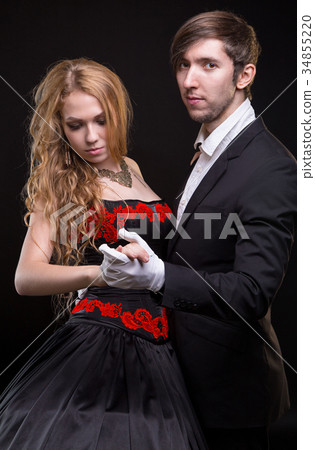 Young couple in concert costume 34855220