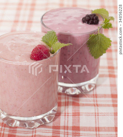 Сocktail of banana with frozen blackberries Сocktail of banana with frozen blackberries 34856228