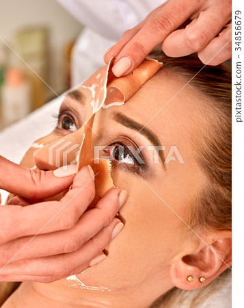 Collagen face mask. Facial skin treatment. Woman 34856679