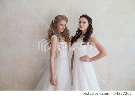 two brides on wedding wedding blonde brunette two brides on wedding wedding blonde brunette 34857262