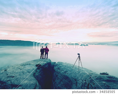 Photographying in wild nature. Nature photographer Photographying in wild nature. Nature photographer 34858505