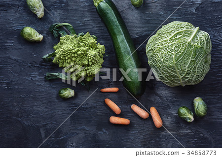 Organic vegetables on wooden table. Top view Organic vegetables on wooden table. Top view 34858773