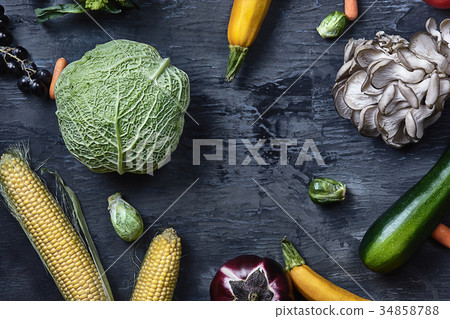 Organic vegetables on wooden table. Top view Organic vegetables on wooden table. Top view 34858788