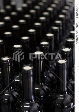 wine being bottled at the winery wine being bottled at the winery 34858859