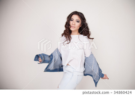 beautiful girl posing on a white background curls beautiful girl posing on a white background curls 34860424