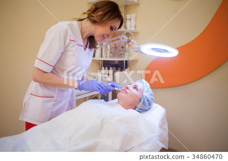 doctor beautician increases lip patient an doctor beautician increases lip patient an 34860470
