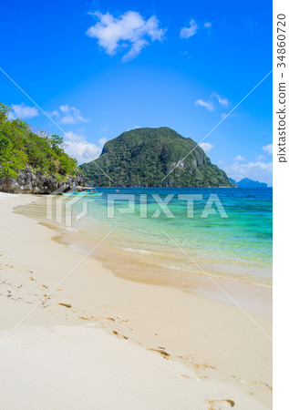 Sandy beach with an traditional banca boat in Sandy beach with an traditional banca boat in 34860720