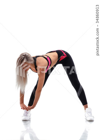 Fitness woman doing stretching workout 34860913