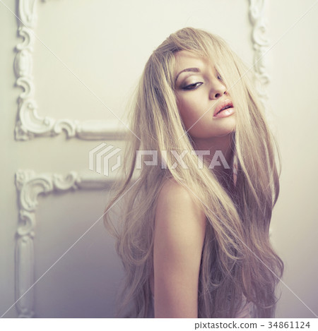 Sensual lady in classical interior 34861124