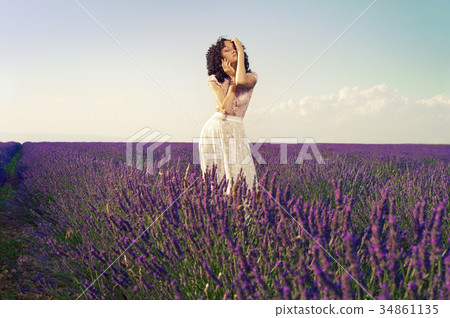 Romantic woman in fairy lavender fields 34861135