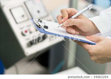Hands of woman engineer ready for writing Hands of woman engineer ready for writing 34863264