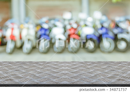 steel plate slip with blur showroom motorcycle  34871737