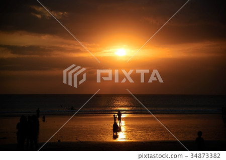 Sunset and two people Sunset and two people 34873382