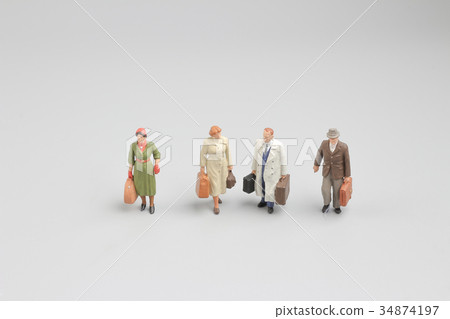 mini of figure on travel with luggage 34874197