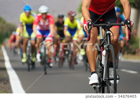 Cycling competition,cyclist athletes riding a race 34876405