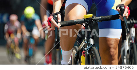 Cycling competition,cyclist athletes riding a race 34876406