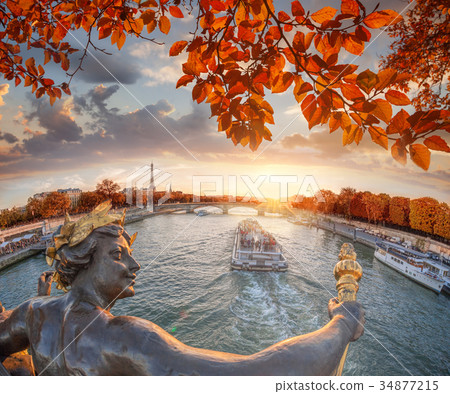 Paris, Eiffel Tower with  autumn leaves in France 34877215